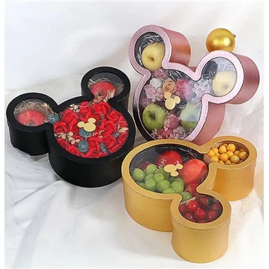 Bunte Geschenkboxen in Micky-Maus-Form